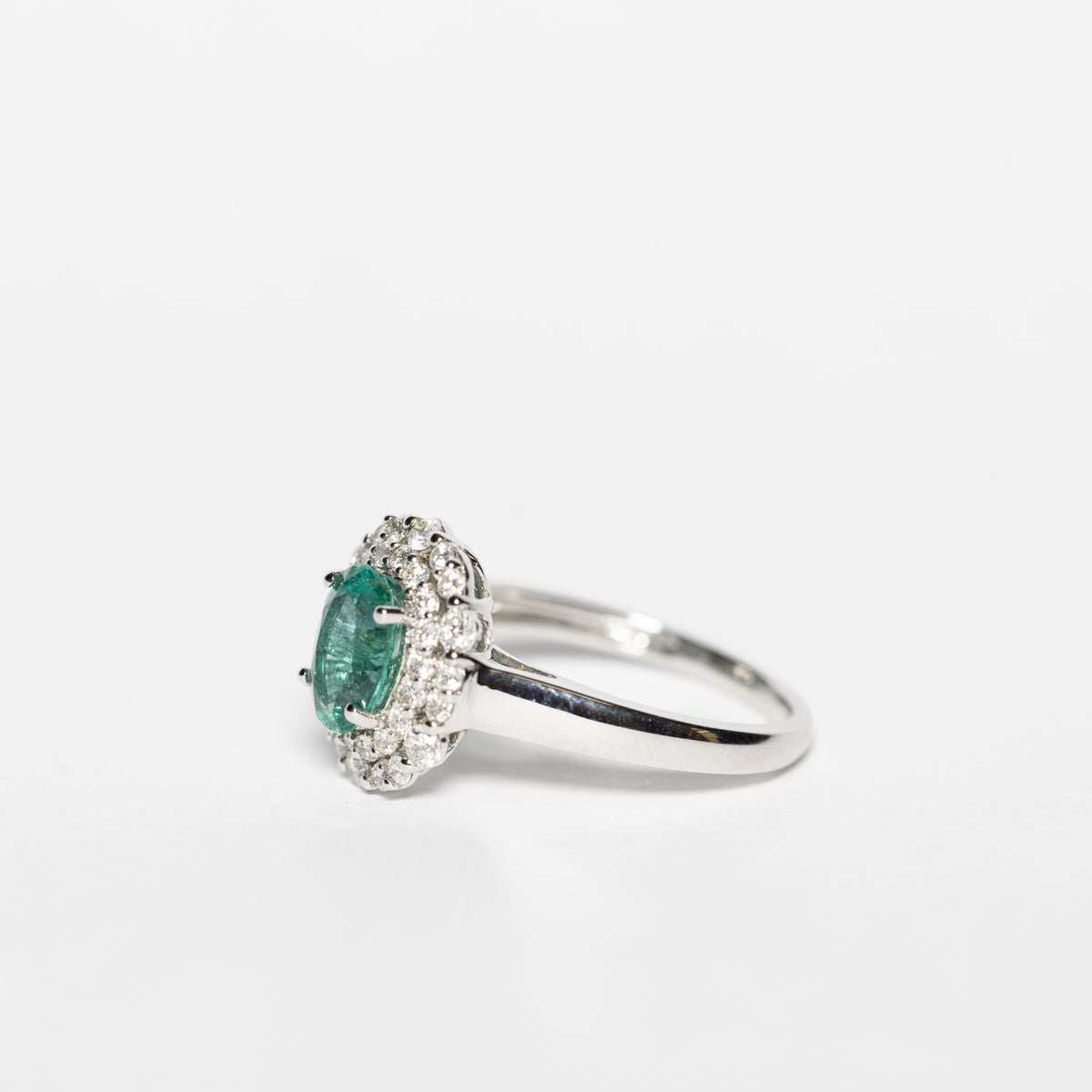 18kt White Gold Ring With Emerald And Double Row Of Diamonds