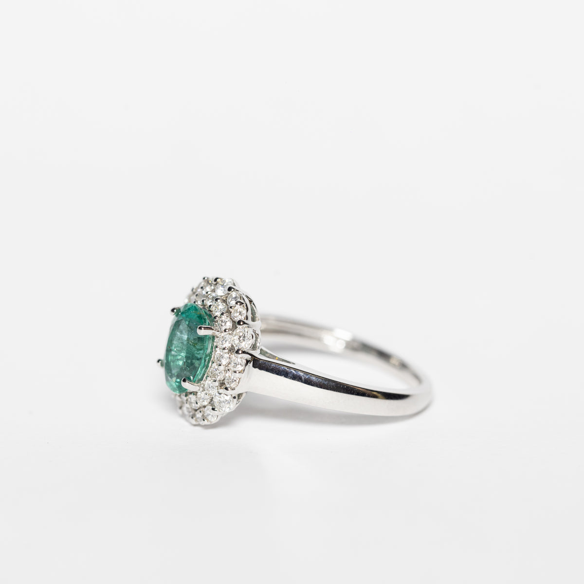 18kt White Gold Ring With Emerald And Double Row Of Diamonds