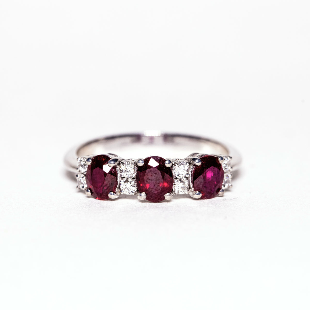18kt White Gold Trilogy Ring with Oval Rubies and Diamonds