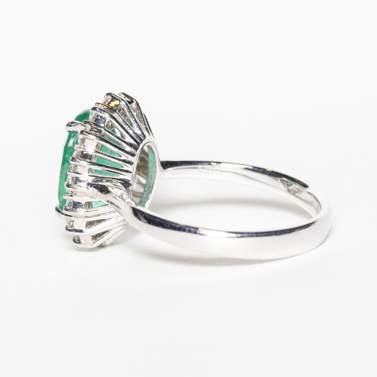 18KT White Gold Ring with 2.11 ct Oval Emerald and Diamond Surround