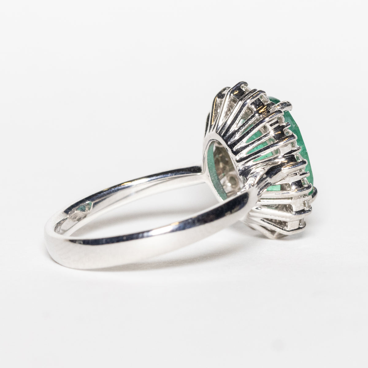 18KT White Gold Ring with 2.11 ct Oval Emerald and Diamond Surround