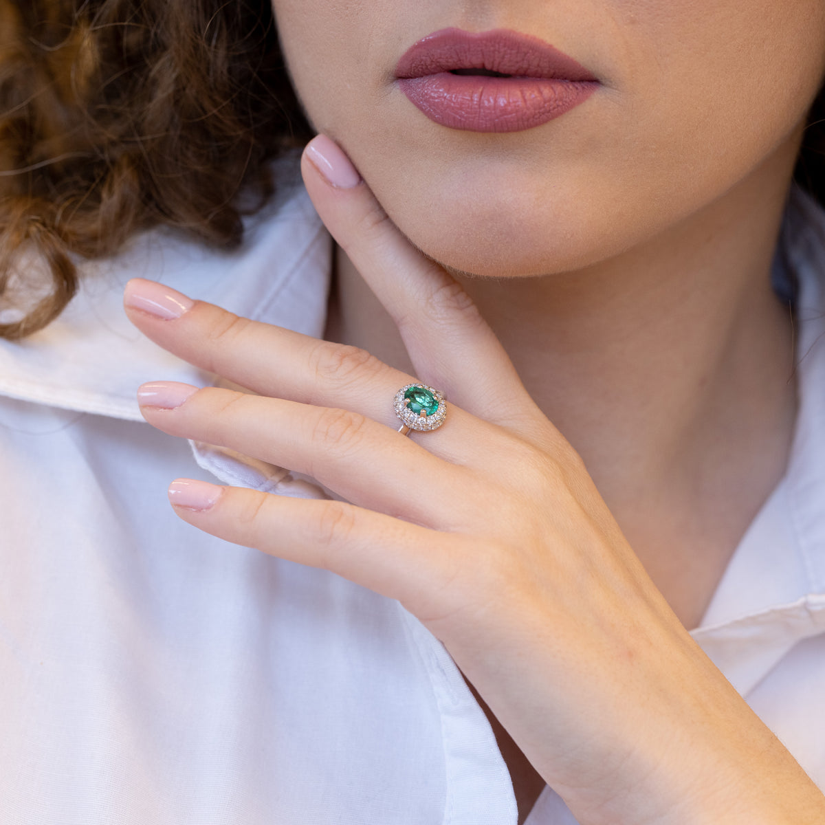 18K White Gold Ring With Oval Emerald And Double Row Of Diamonds