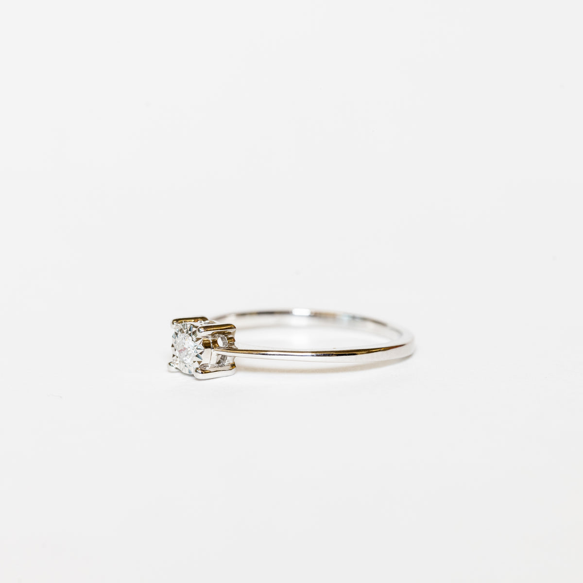 Solitaire Ring In 18kt White Gold And 0.12kt Diamond