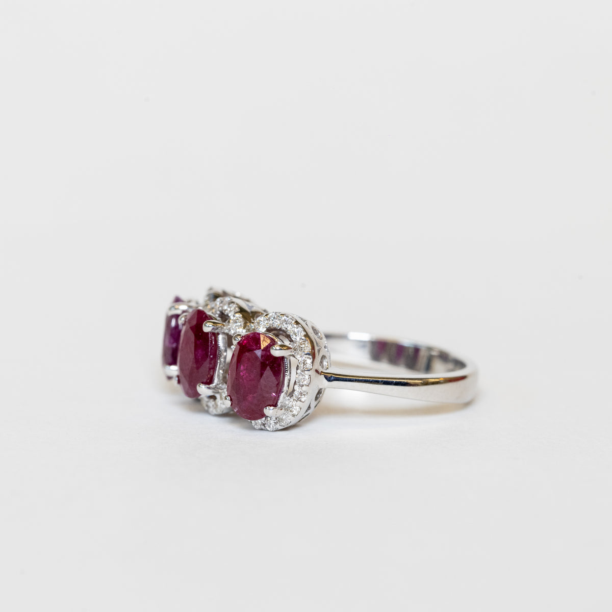 18KT White Gold Trilogy Ring with Oval Shape Rubies and Diamonds