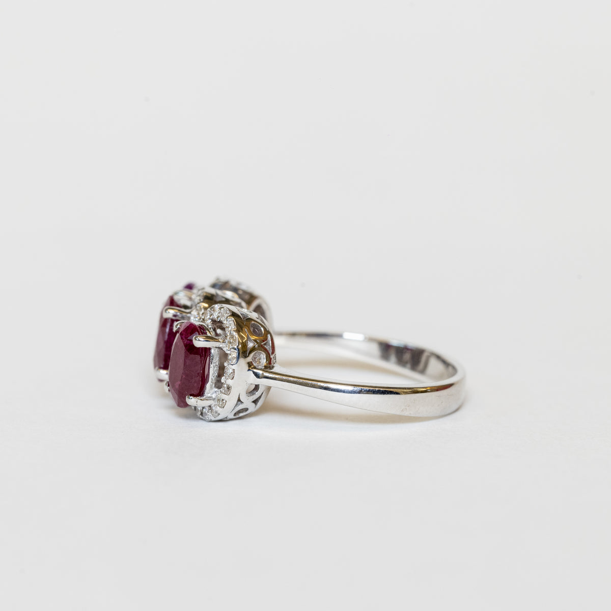 18KT White Gold Trilogy Ring with Oval Shape Rubies and Diamonds