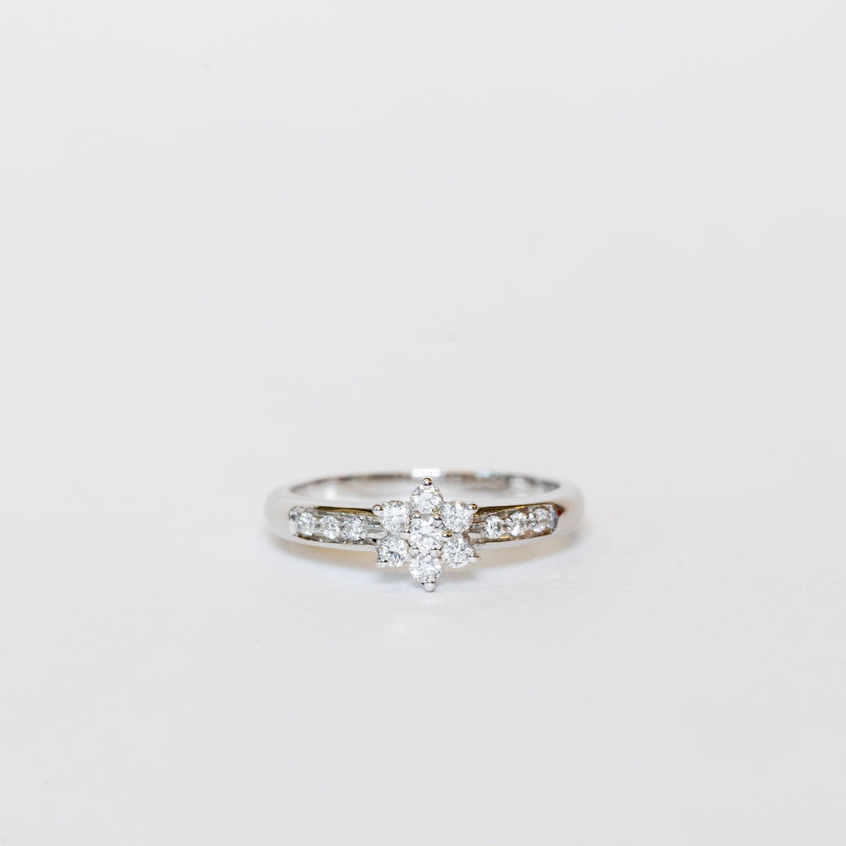 Solitaire Ring With Central Flower In Diamond Pavè
