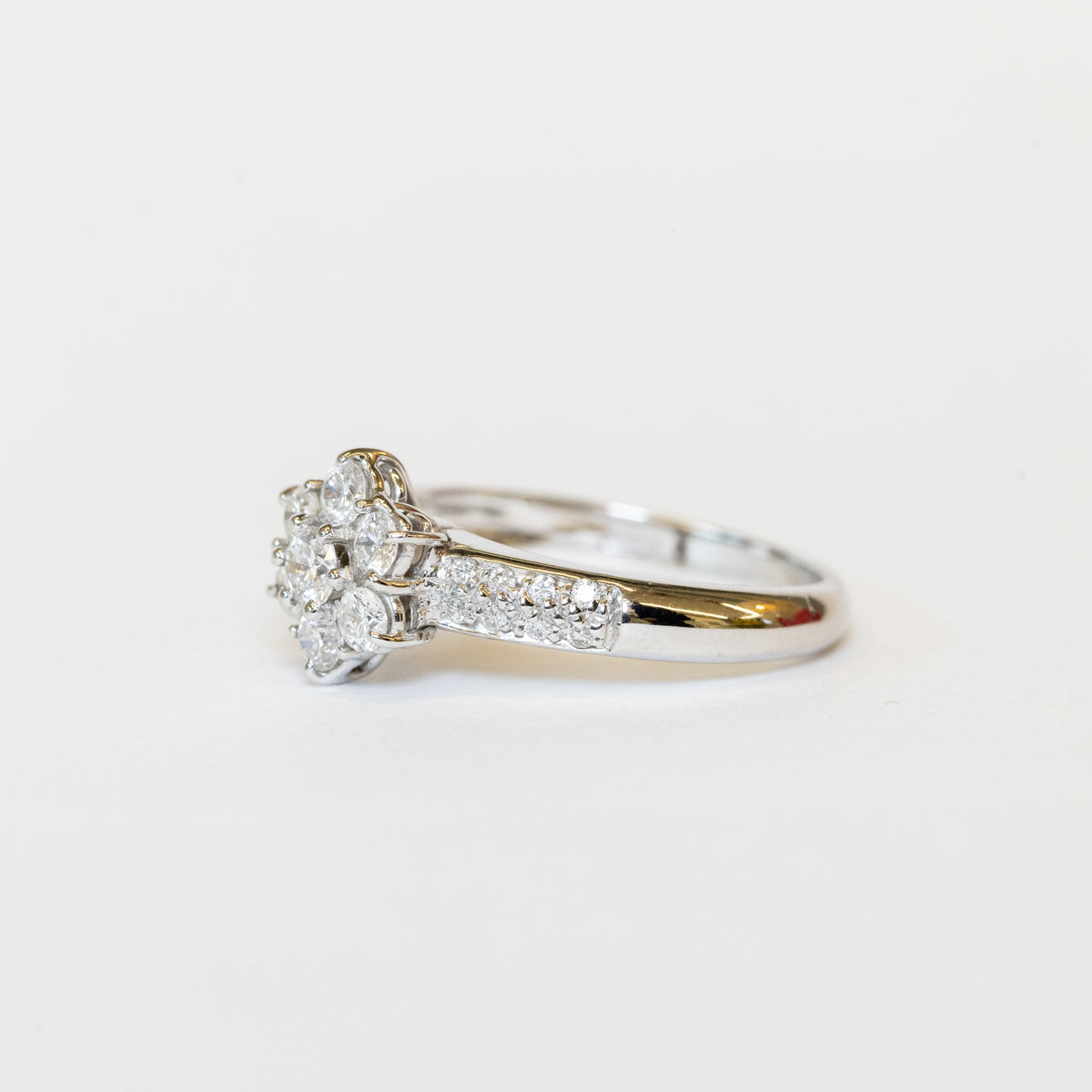 18K White Gold Solitaire Ring With Pavé Diamond Flower