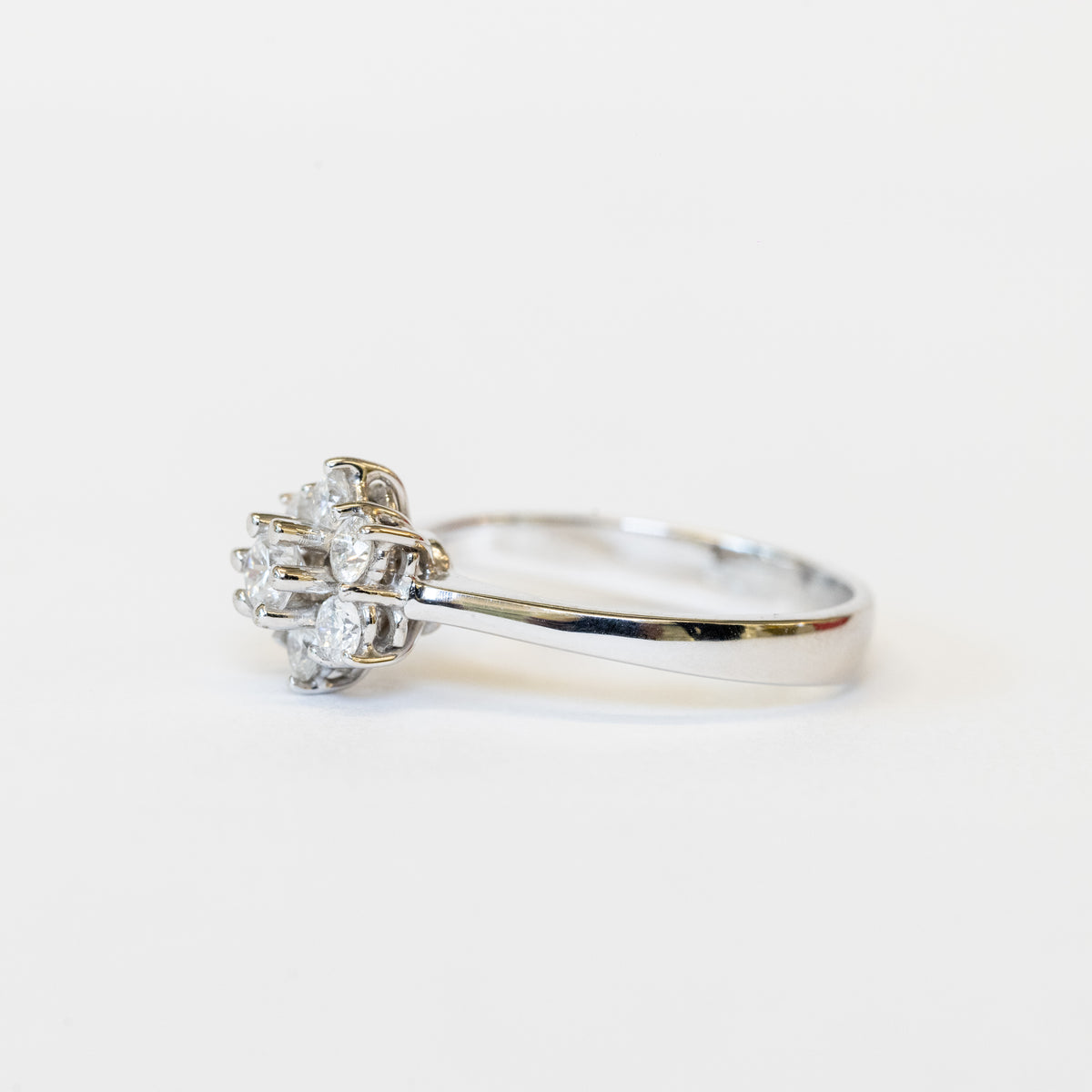 18K White Gold Solitaire Ring With Pavé Diamond Flower