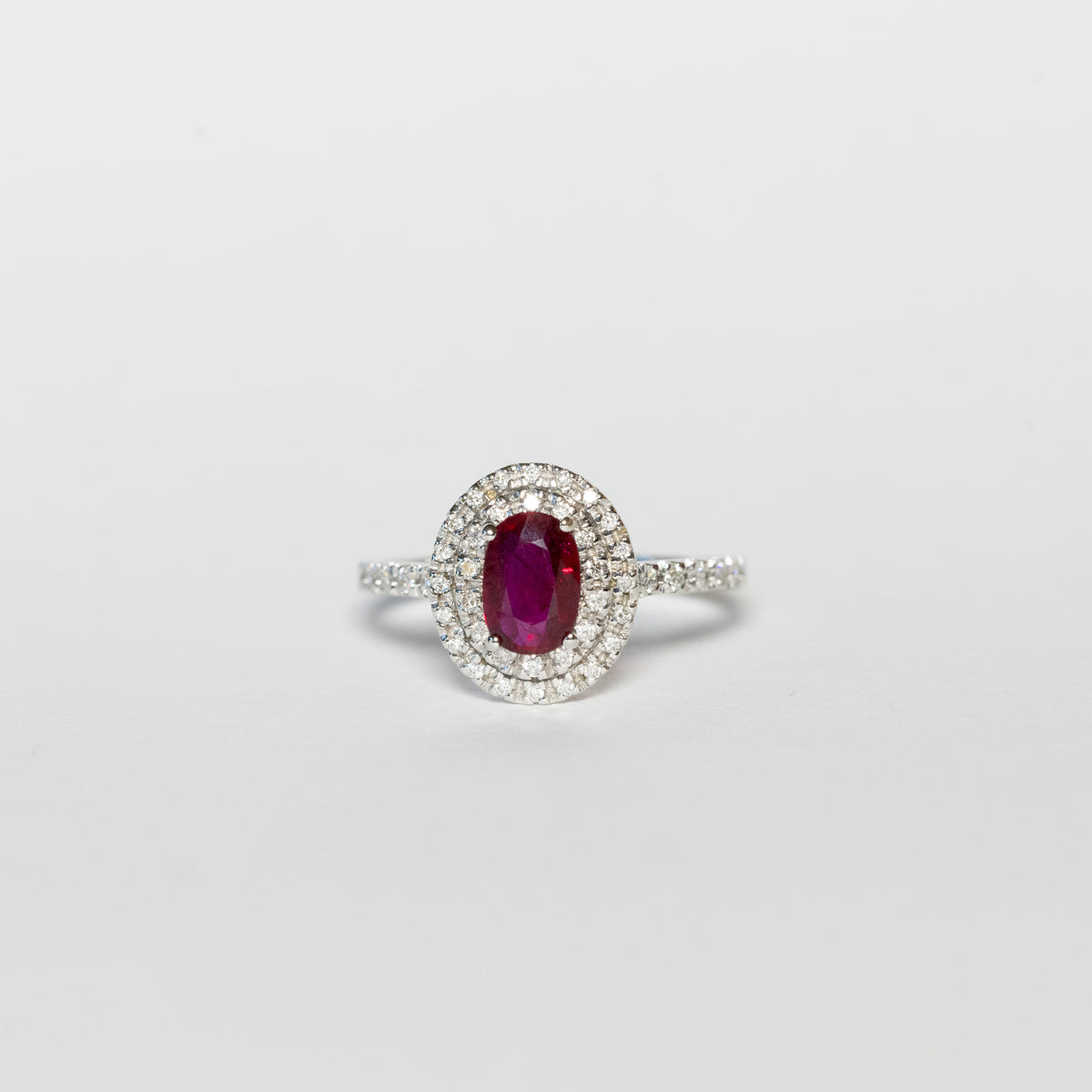18kt White Gold Ring With Central Ruby and Double Row of Diamonds