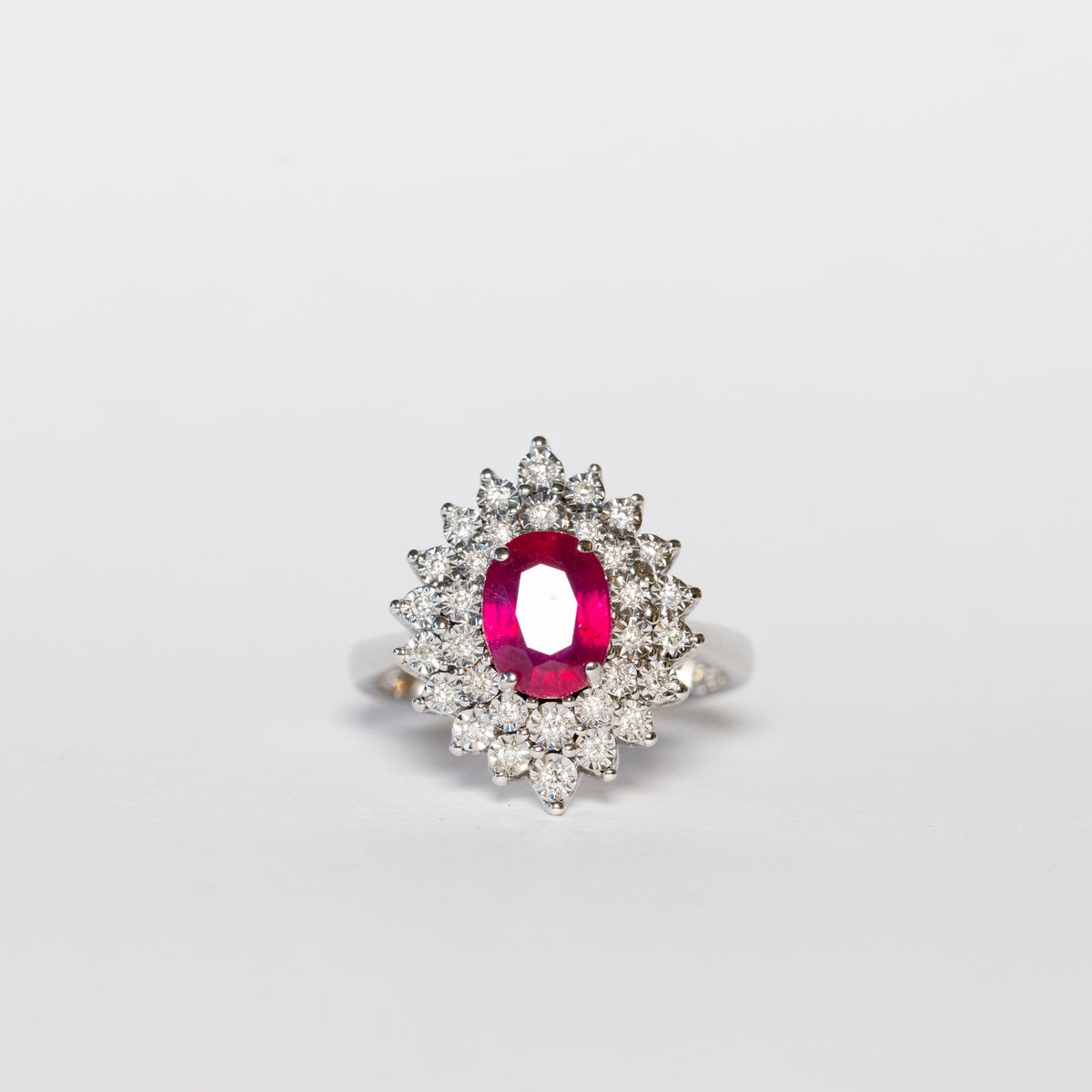 18kt White Gold Ring with Central Ruby and Double Row of Diamonds