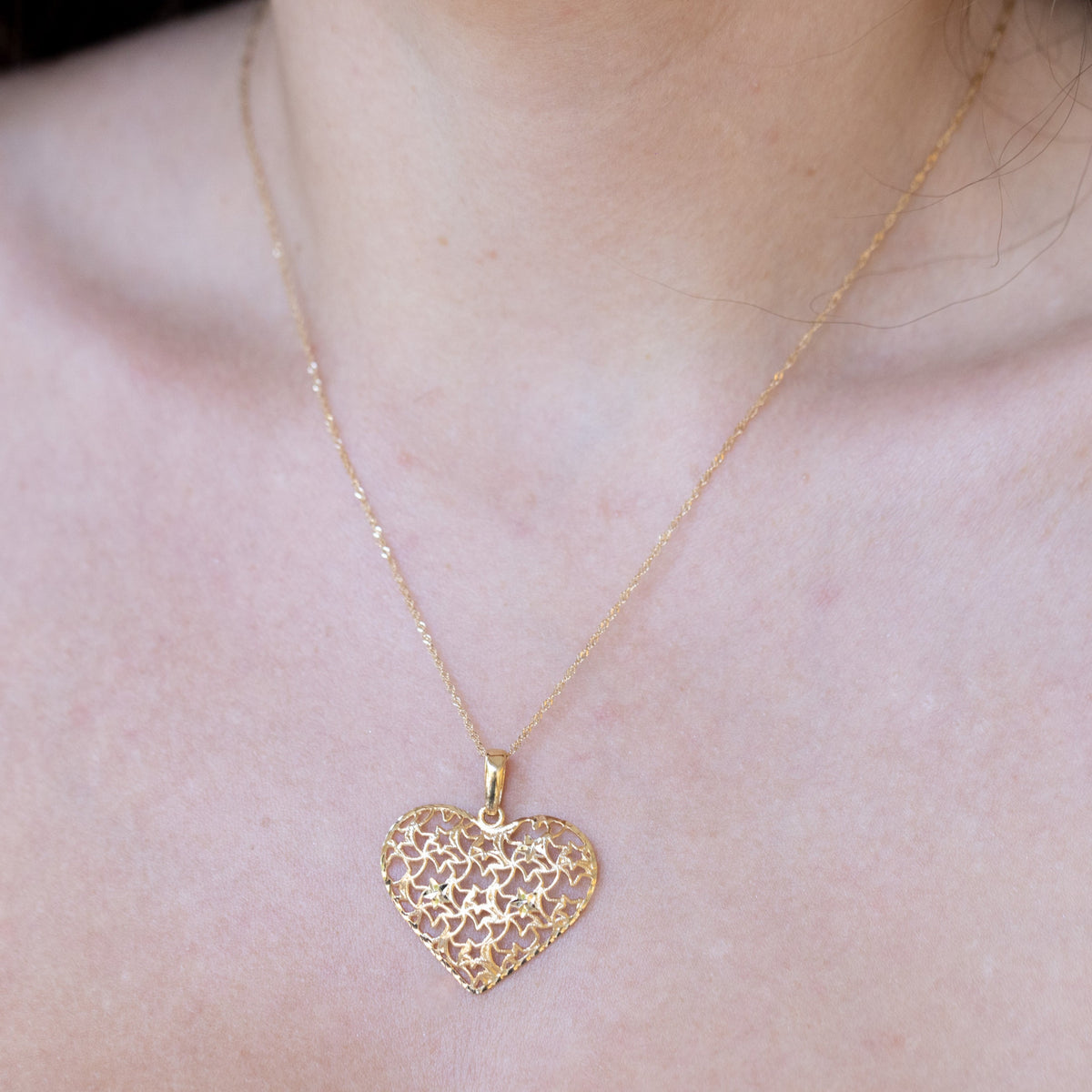Collana in Oro Giallo 18 kt  con fantasia "Cuore di Stelle"