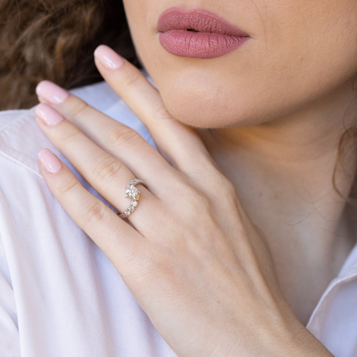 solitaire bypass ring in white gold and diamonds