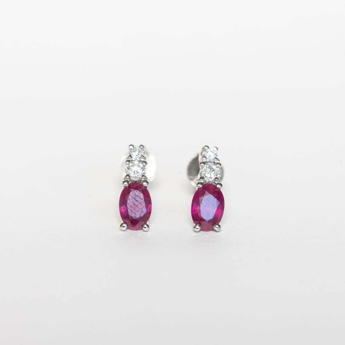 18kt white gold earrings with rubies and diamonds