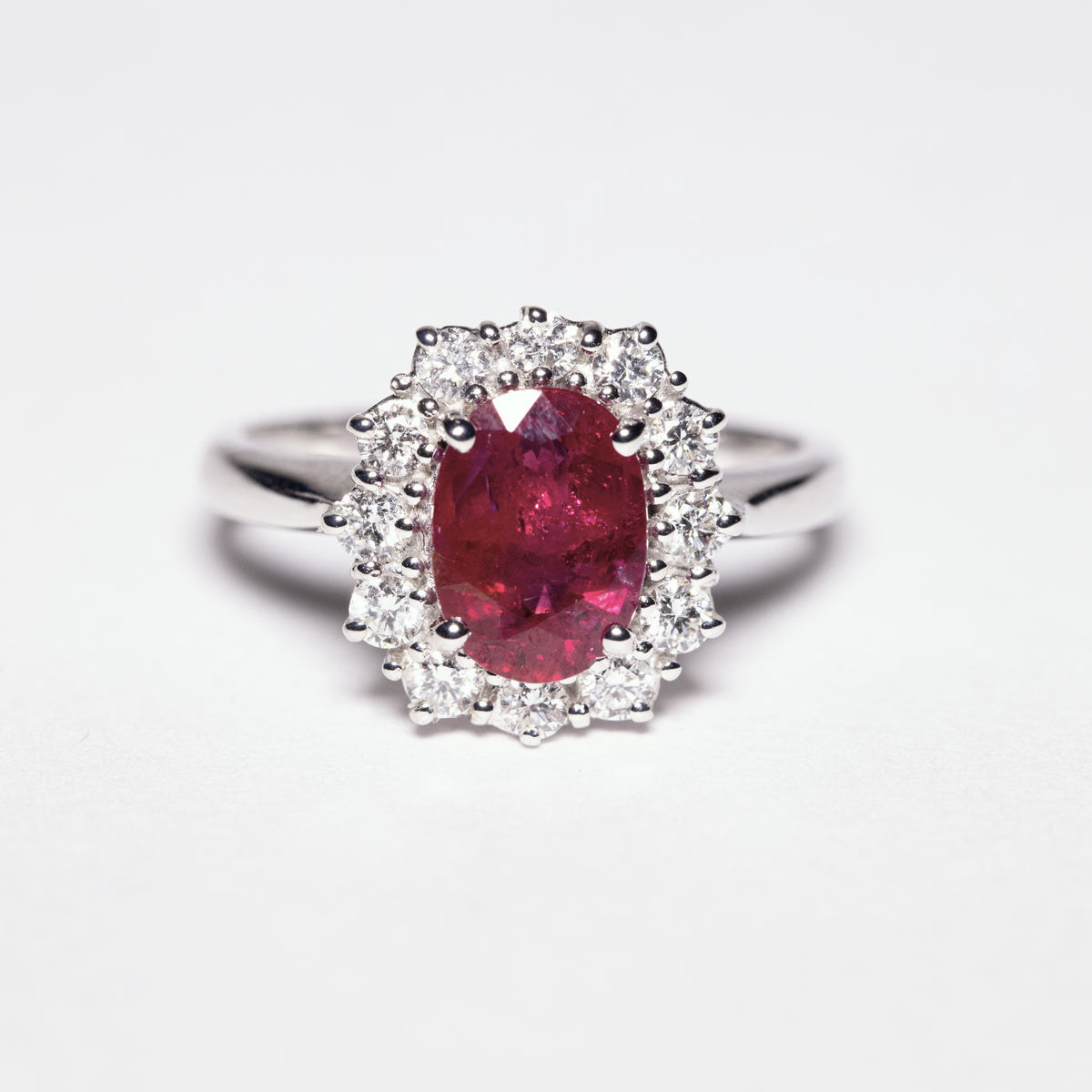 Oval Ruby Ring and Diamond Surround