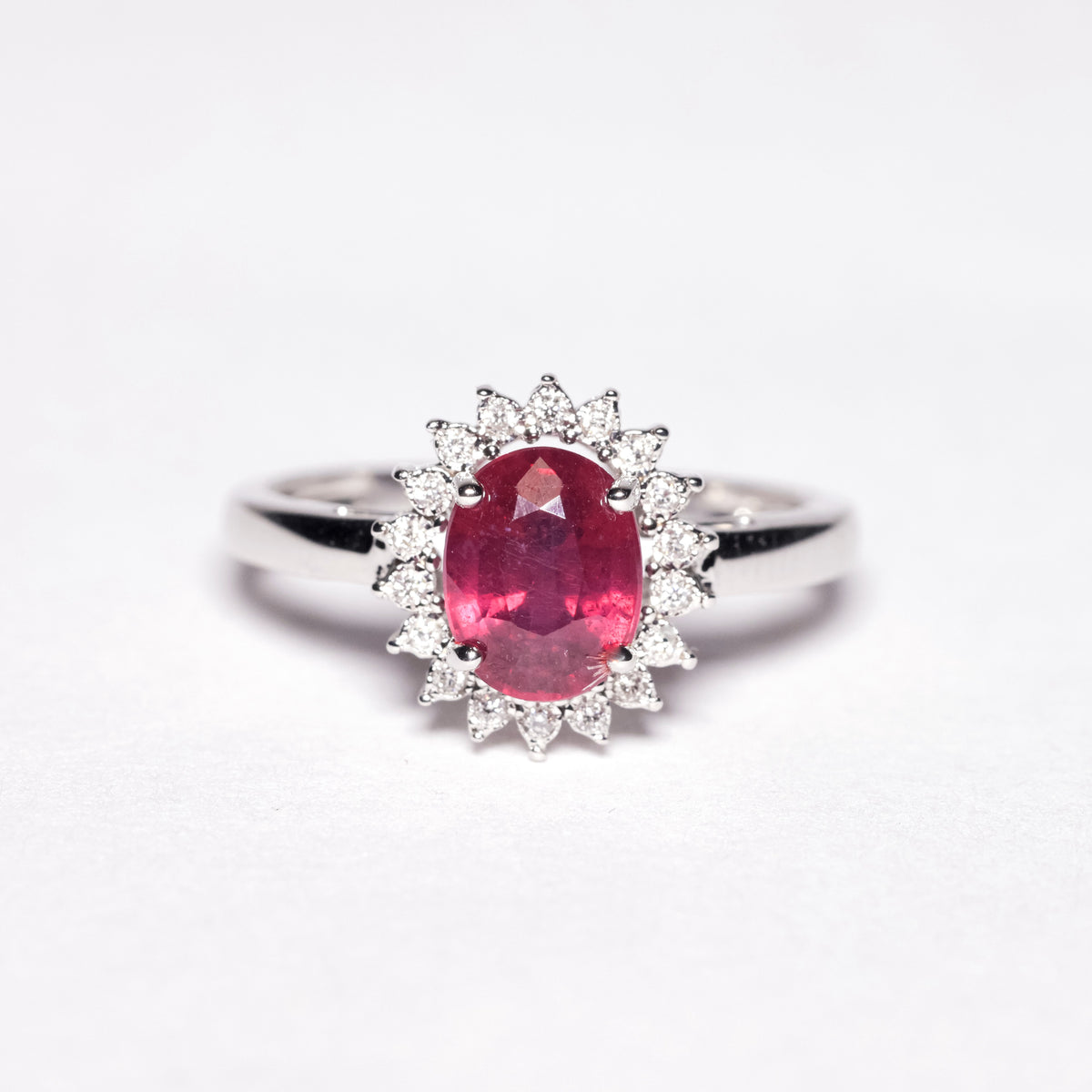 Ring with Ruby and Diamonds around