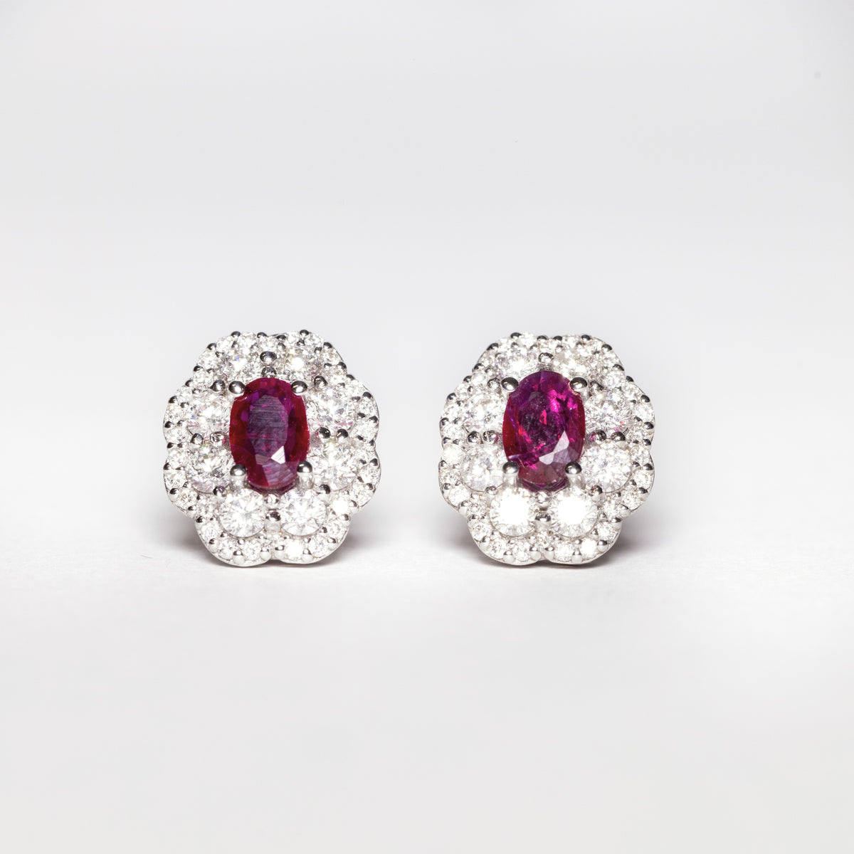 18KT White Gold Earrings With Central Ruby and Double Row of Flower-Shaped Diamonds