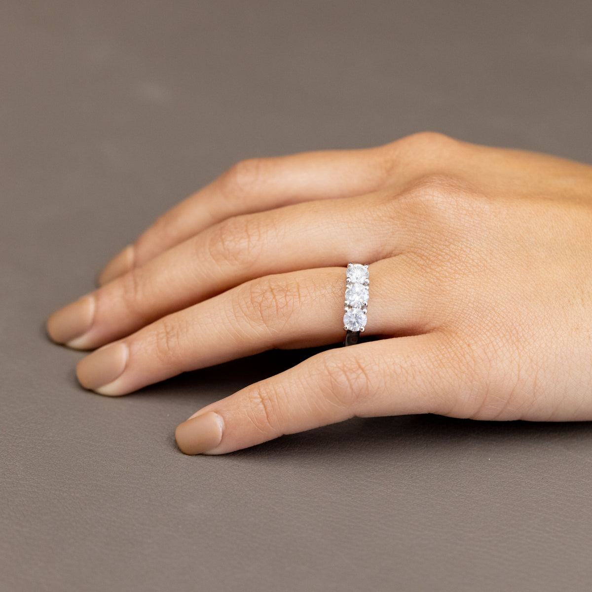 18Kt White Gold Trilogy Ring with Grace Setting