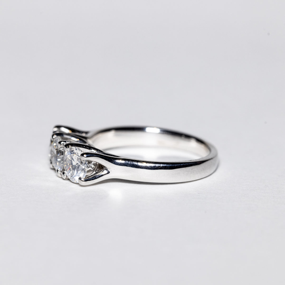 18Kt White Gold Trilogy Ring with Grace Setting
