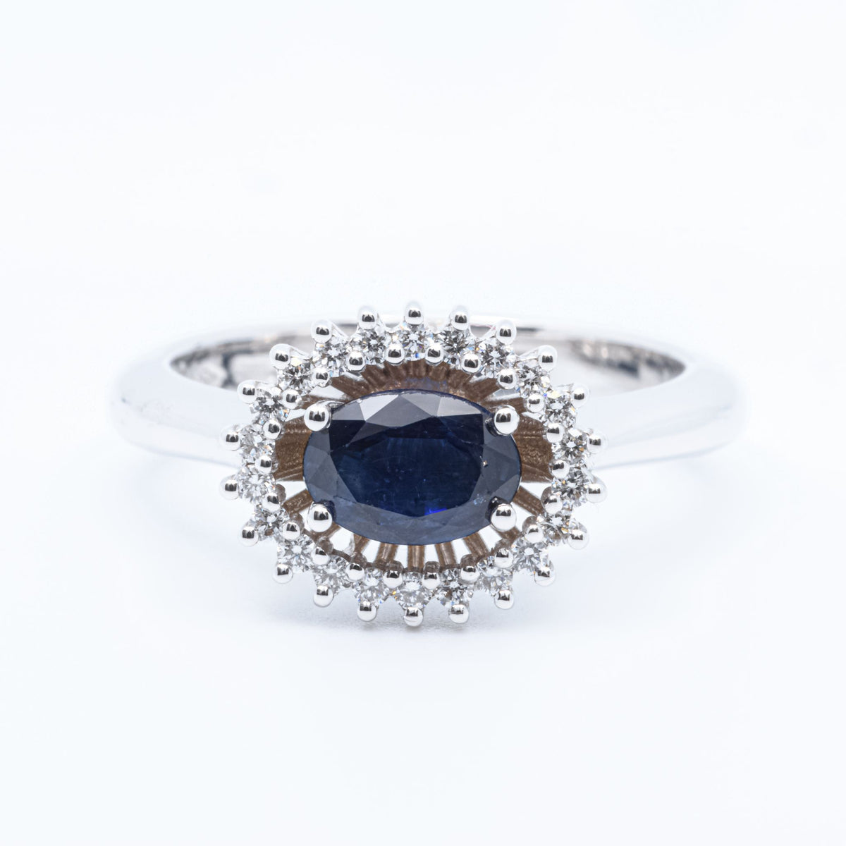 Solitaire Ring with Round Sapphire, Diamonds and 18KT Gold
