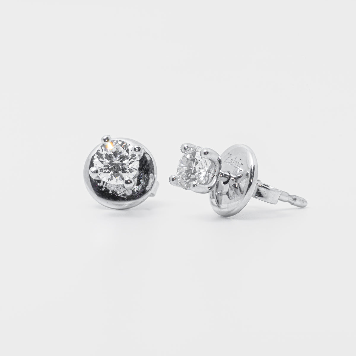 Orecchini punto luce con diamanti e platino 950