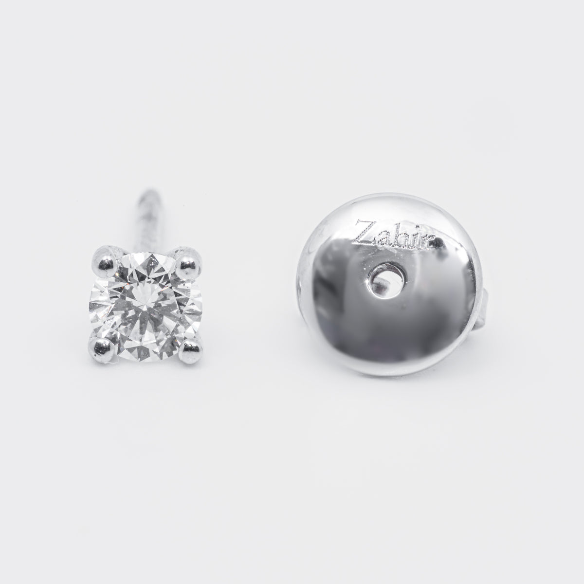 Orecchini punto luce con diamanti e platino 950