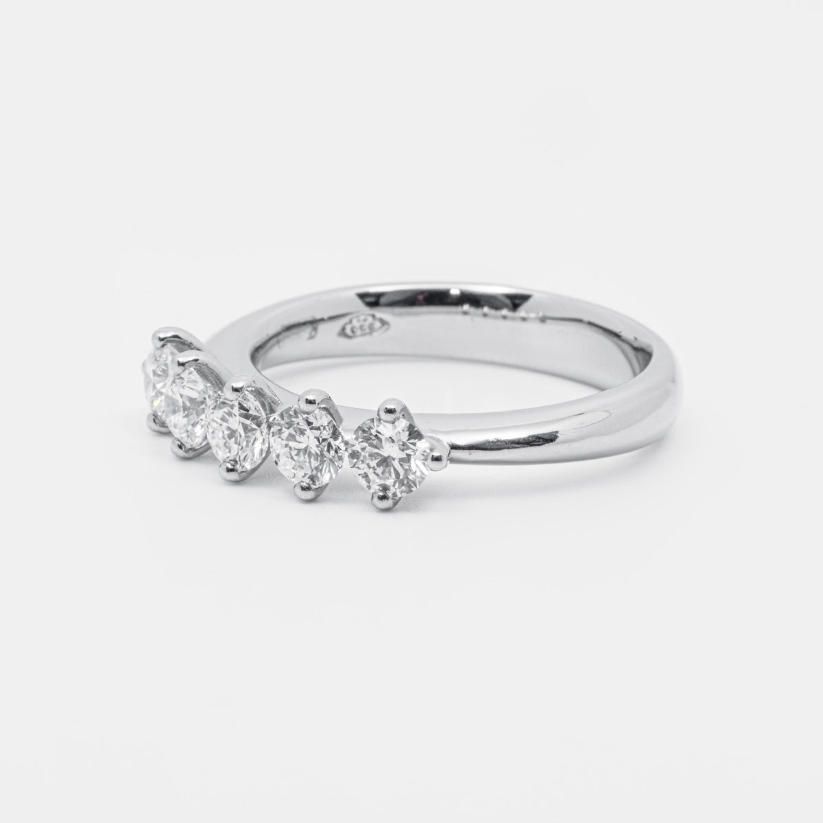 5 stone ring in Platinum and 0.95 kt brilliant cut diamonds