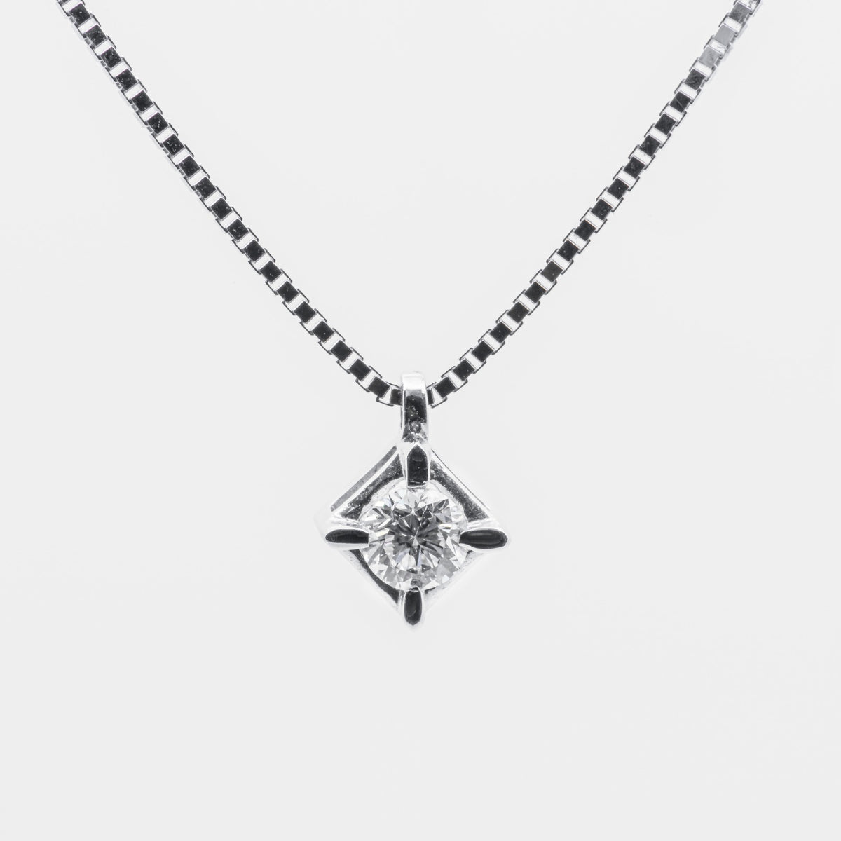 Collier punto luce con diamante in oro bianco 18 kt