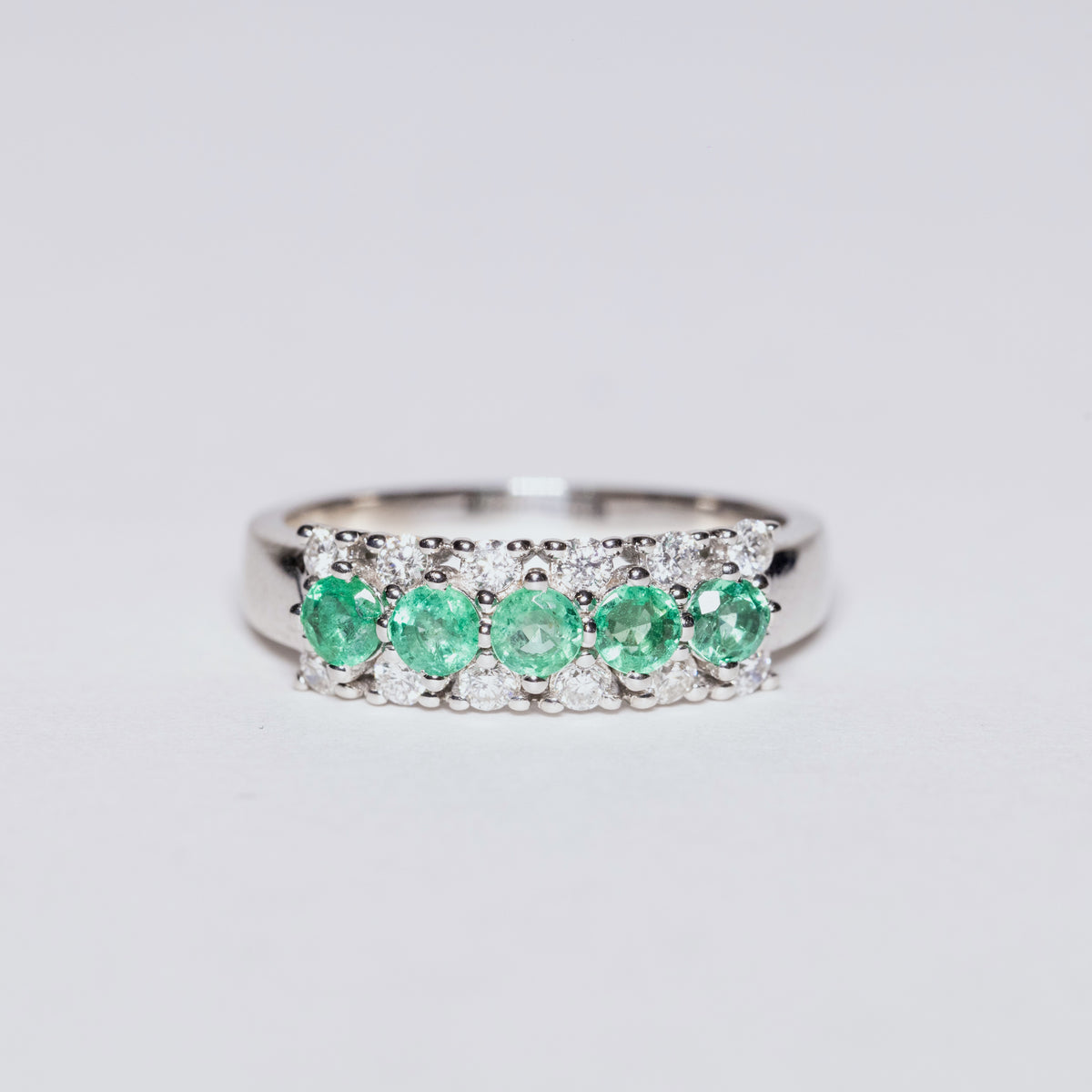 18kt White Gold Veretta Ring with Emeralds and Diamonds