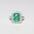 Anello in Oro Bianco 18 KT con Smeraldo Taglio Emerald e Giro di Diamanti