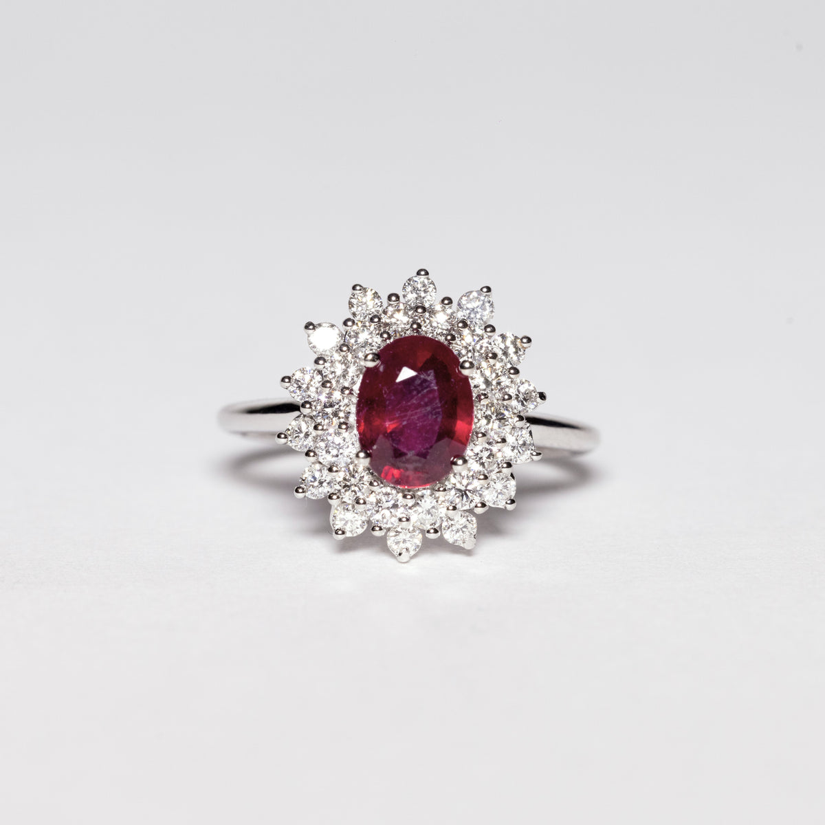 18kt White Gold Ring With Central Ruby and Snowflake Shape Diamonds