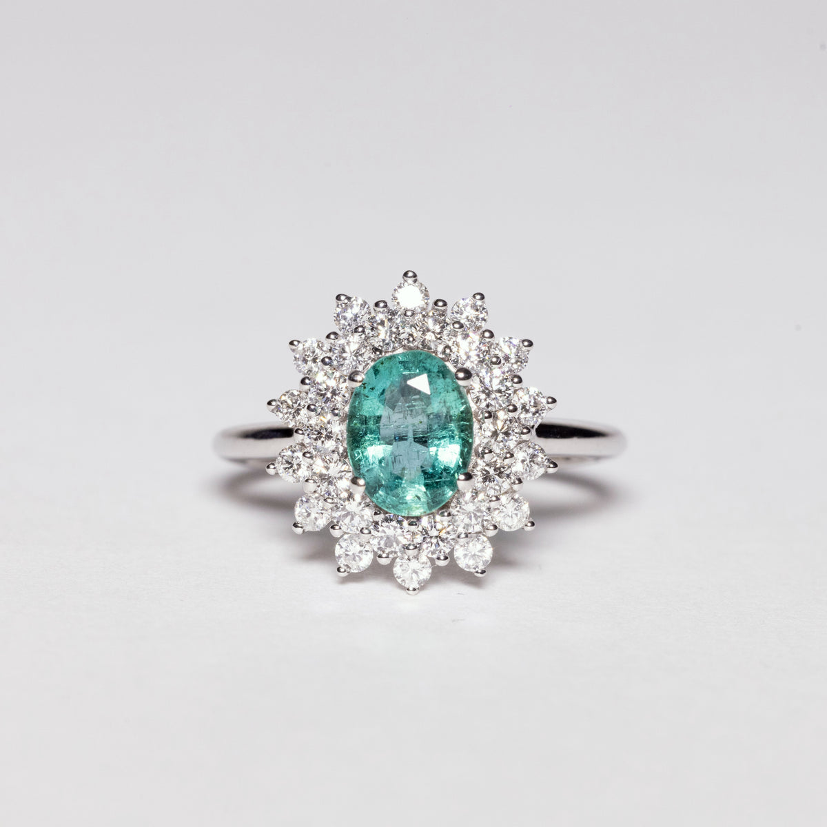 18KT White Gold Ring Snowflake Fantasy With Central Emerald and Diamond Row
