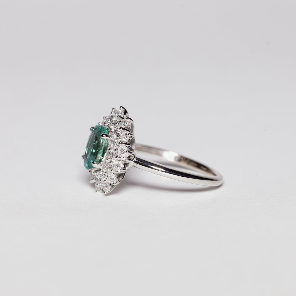 18KT White Gold Ring Snowflake Fantasy With Central Emerald and Diamond Row