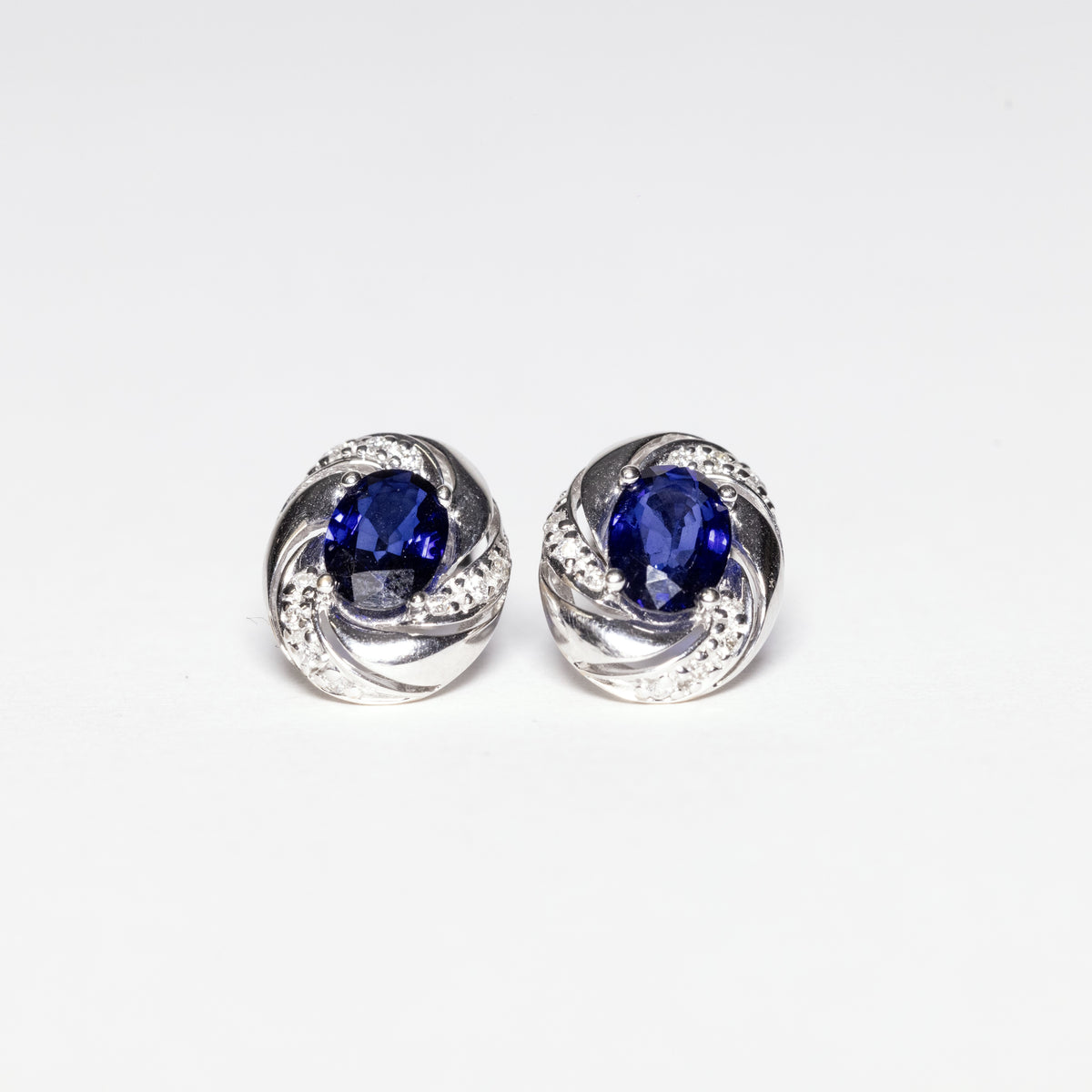 18KT White Gold Earrings With Oval Cut Sapphire and Diamonds