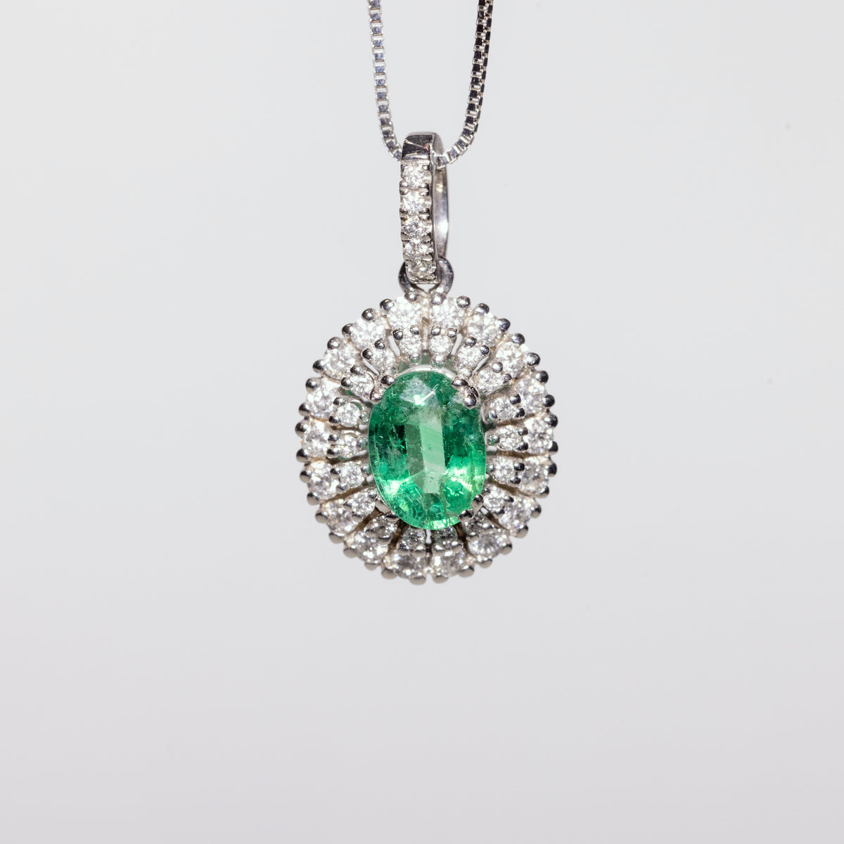 18KT White Gold Necklace With Central Emerald and Double Row of Diamonds