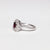 Anello in Oro Bianco 18 KT Fantasia Fiore Con Rubino Centrale e Doppio Giro di Diamanti