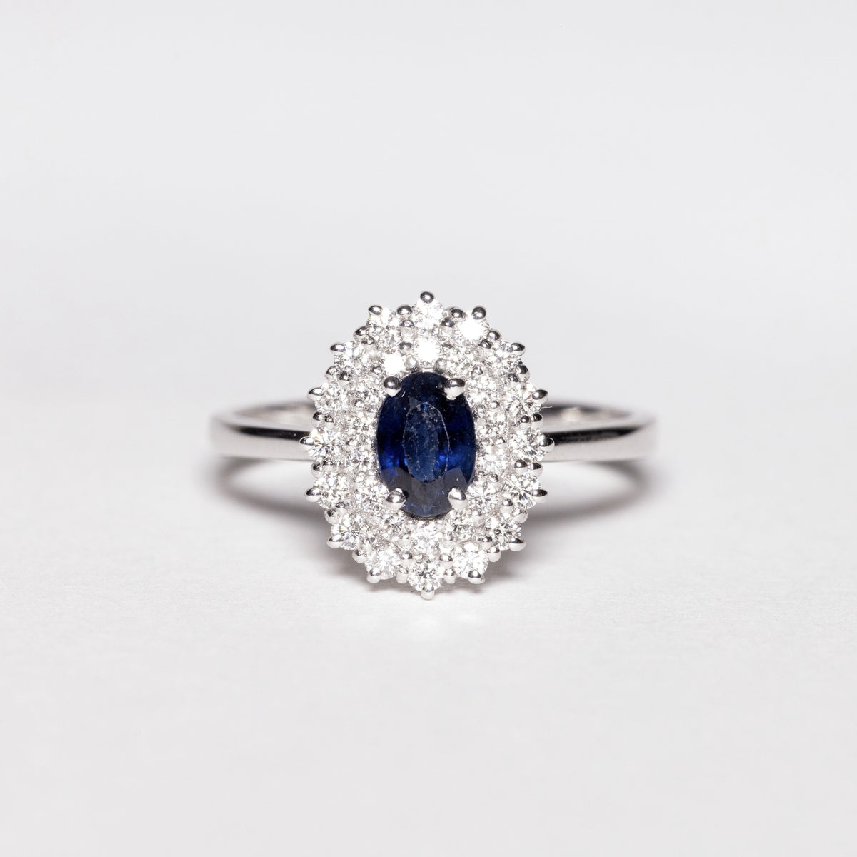 18KT White Gold Ring With Sapphire and Double Row of Diamonds