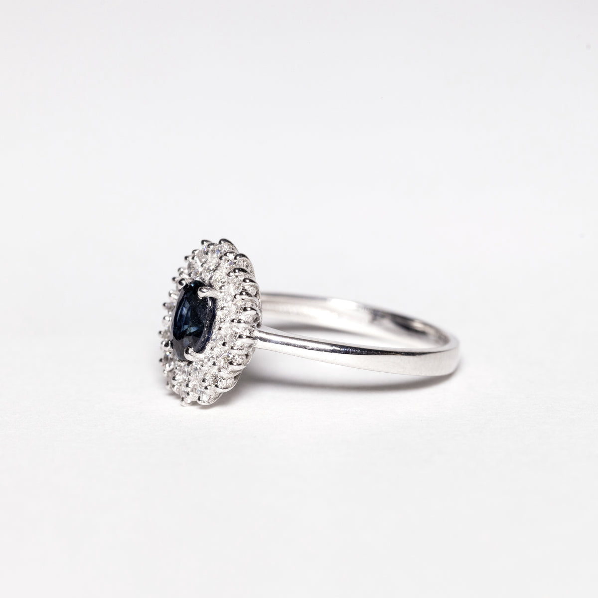 18KT White Gold Ring With Sapphire and Double Row of Diamonds