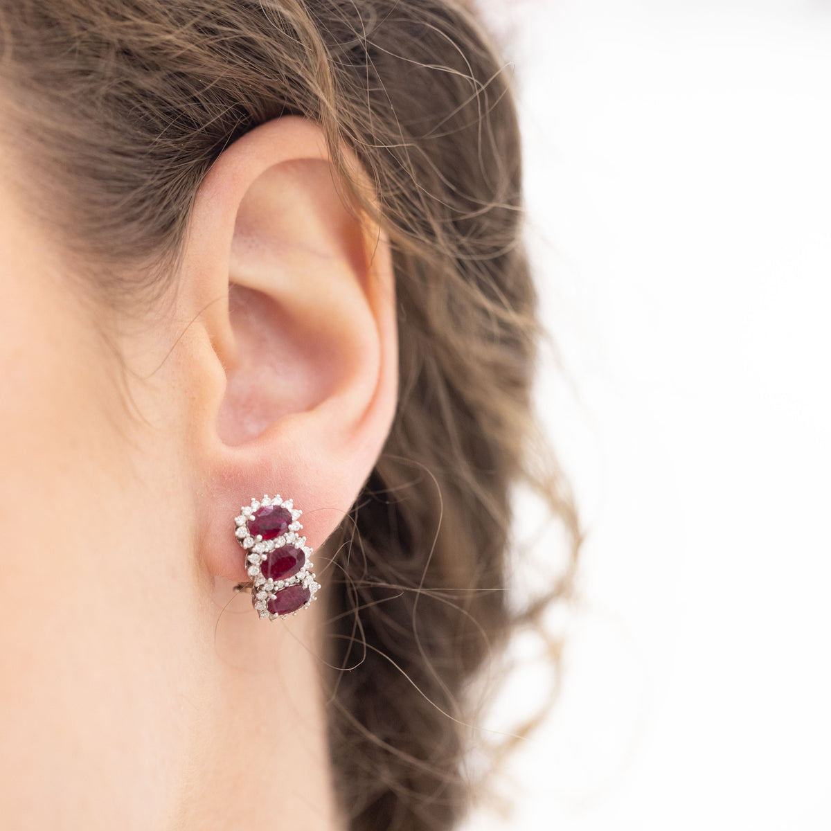 18K White Gold Trilogy Earrings With Rubies Surrounded By Diamonds