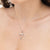 Collana Croce Asimmetrica In Oro Bianco 18 Kt E Diamanti