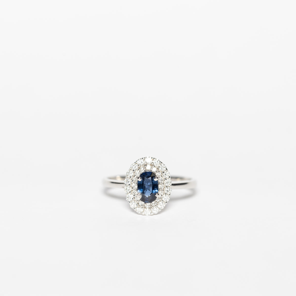 Anello In Oro Bianco 18 Kt Con Zaffiro E Doppio Giro Di Diamanti