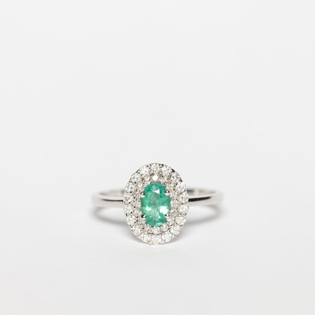 18K White Gold Ring With Emerald And Double Row Of Diamonds