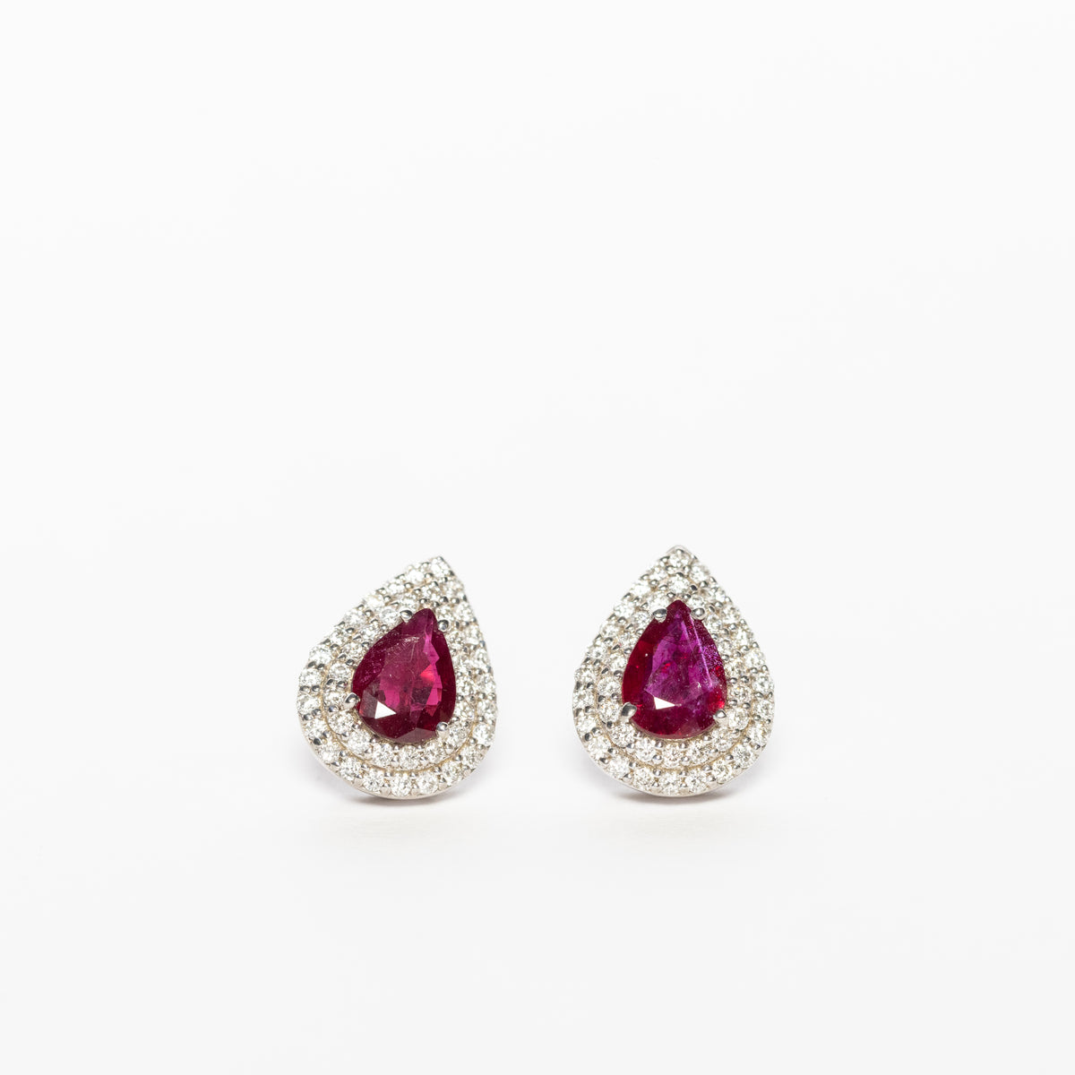18K White Gold Earrings With Drop Cut Rubies Surrounded By Diamonds