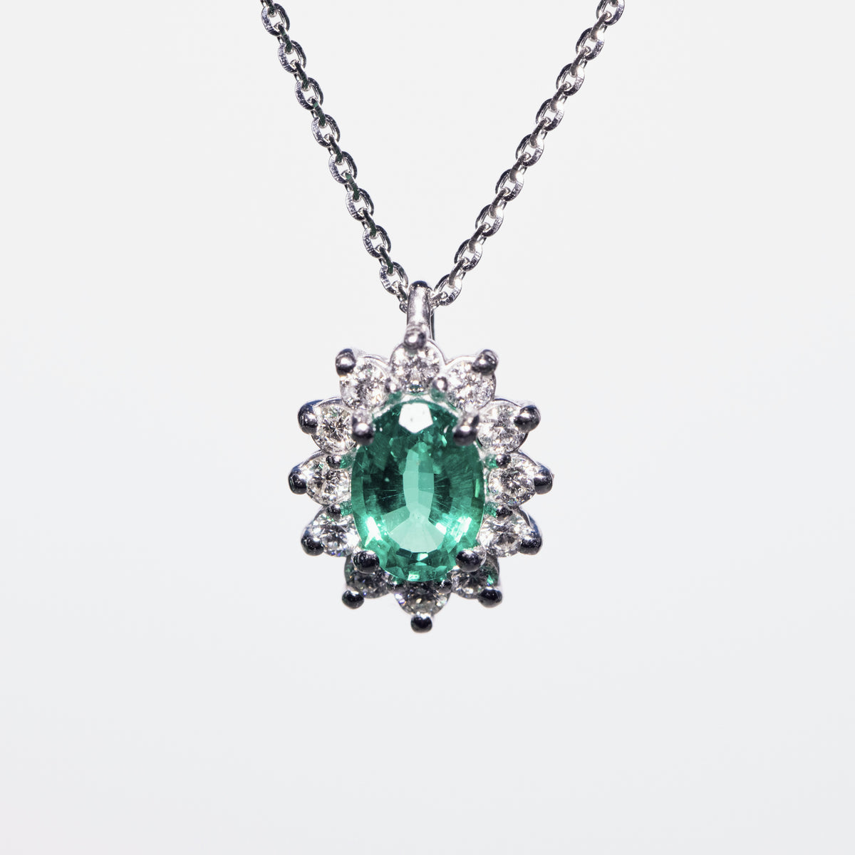 18KT White Gold Necklace with 0.70kt Emerald and Diamonds