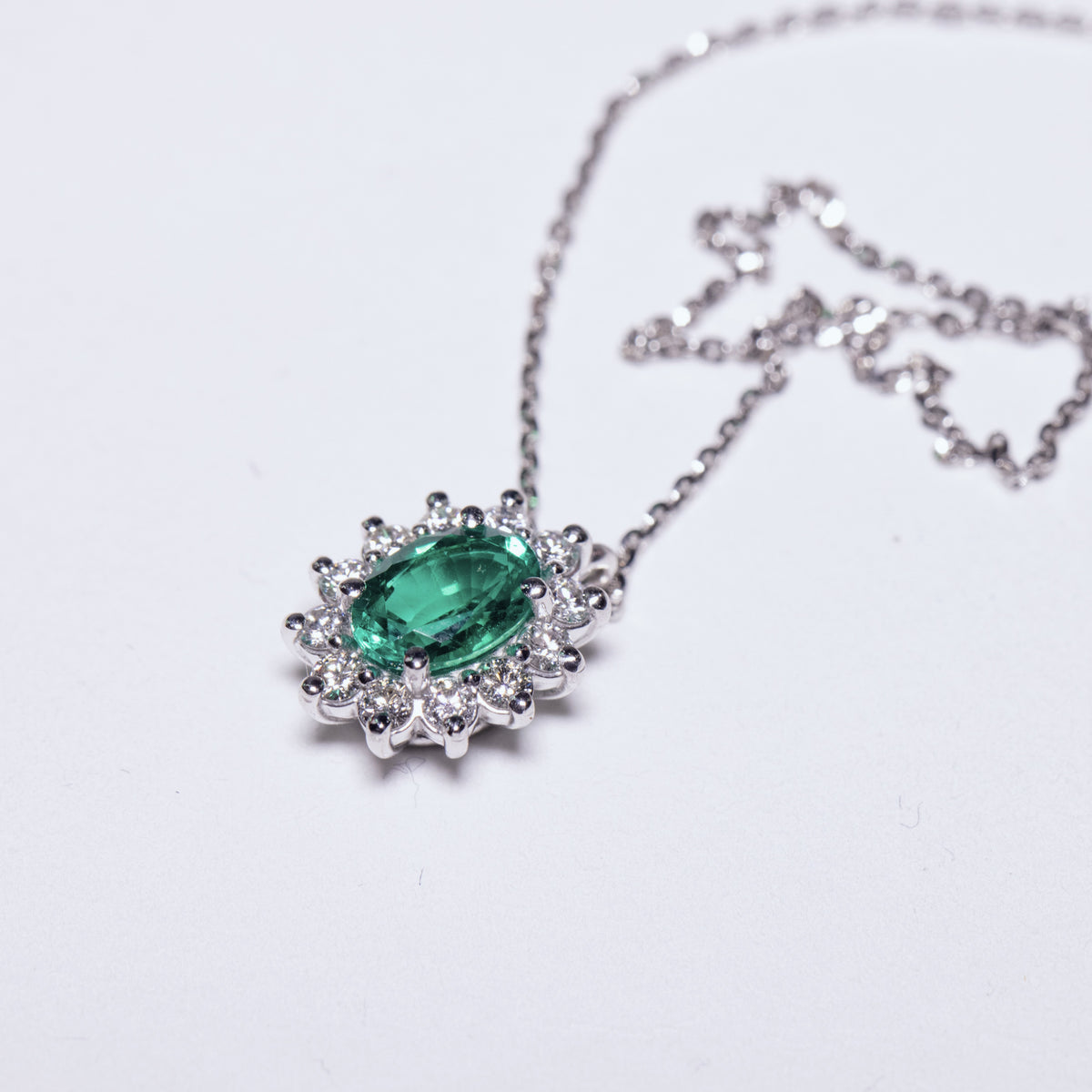 18KT White Gold Necklace with 0.70kt Emerald and Diamonds