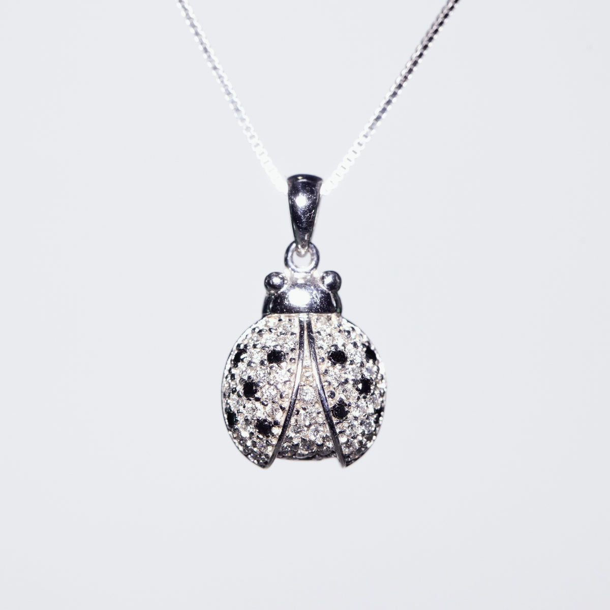 18KT White Gold Ladybug Fantasy Necklace with Black and White Diamonds