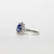 Anello in Oro 18KT con Zaffiro e contorno Diamanti
