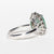 Anello in Oro Bianco 18KT con Smeraldo Ovale da 2,11 ct e contorno in Diamanti