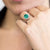 Anello in Oro Bianco 18KT con Smeraldo Ovale da 2,11 ct e contorno in Diamanti