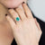 Anello in Oro Bianco 18KT con Smeraldo Ovale da 2,11 ct e contorno in Diamanti