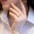 Anello Solitario In Oro Bianco 18 kt E Diamante da 0.12kt